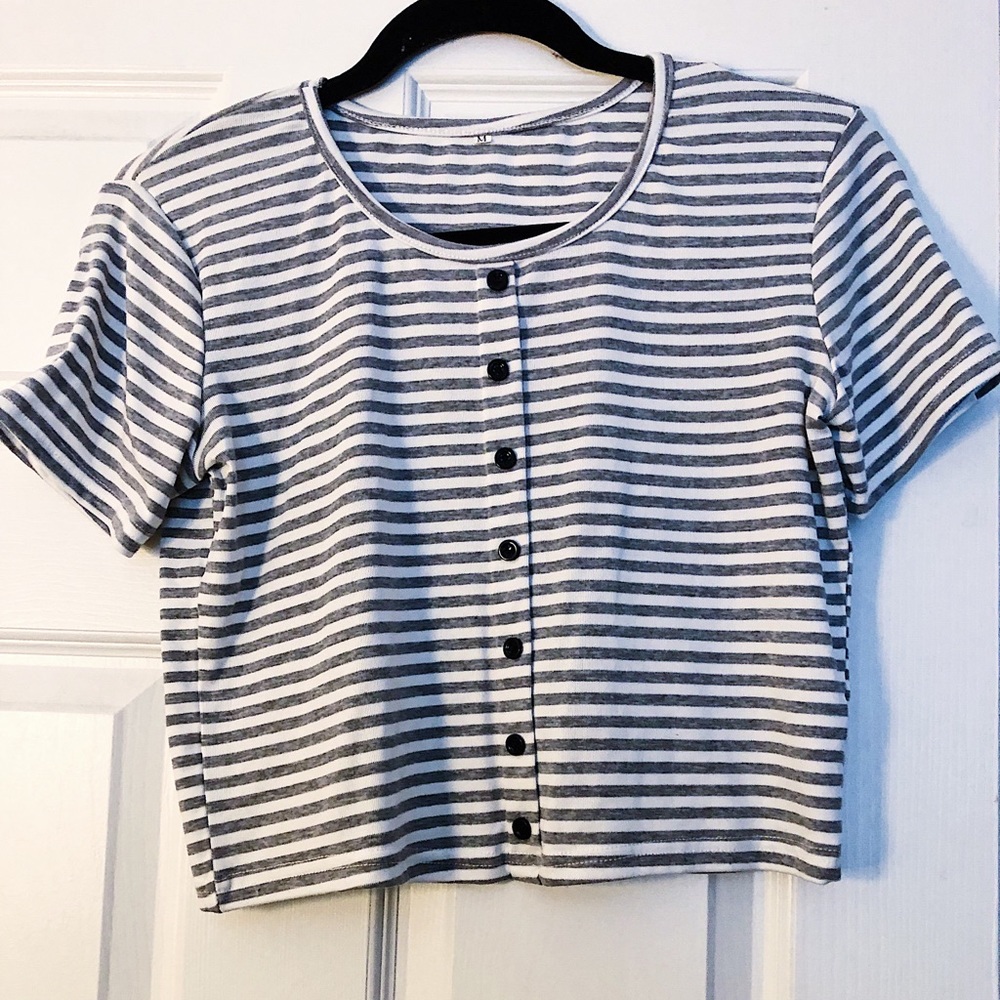 grey and white crop top.